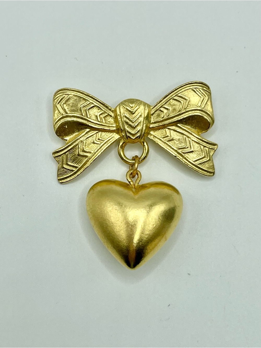 Gold Bow and Heart Pendant Necklace - Elegant Women’s Jewelry
